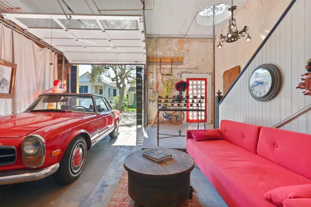 a living room with furniture a window and wall