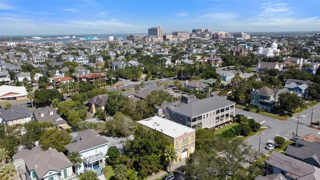 an aerial view of a city with lots of residential buildings