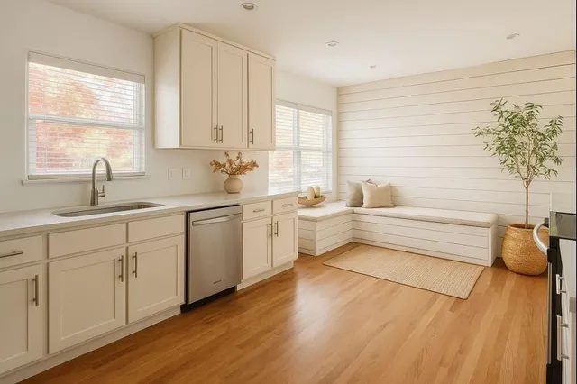 a bathroom with a sink and a window