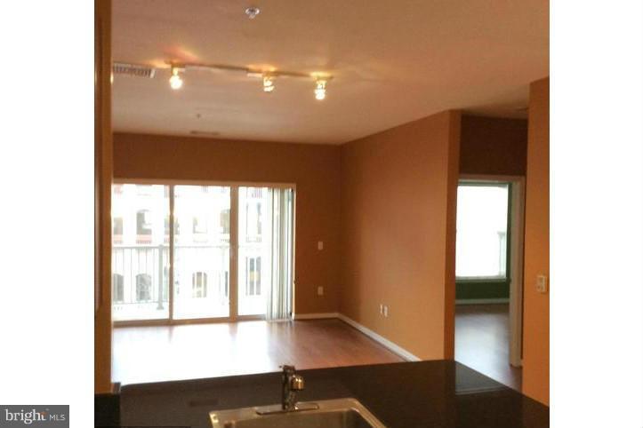 8045 Newell Street, Unit 220 Silver Spring, MD 20910 - Photo 1 of 21 Living Room