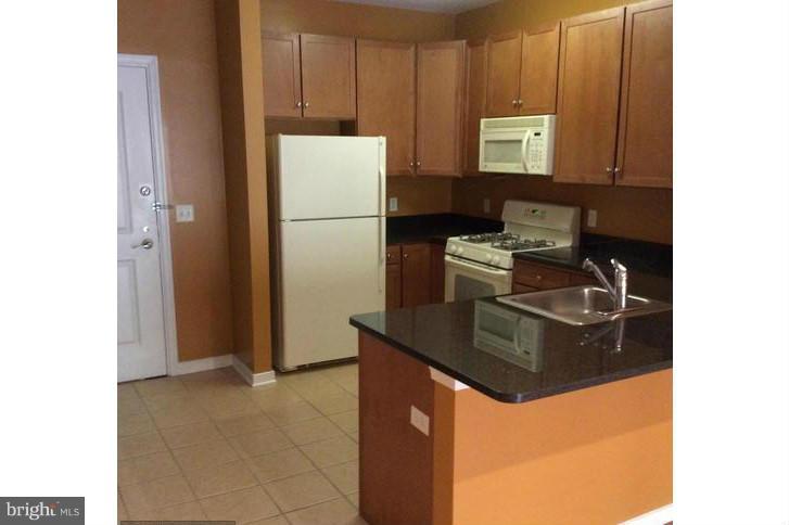 8045 Newell Street, Unit 220 Silver Spring, MD 20910 - Photo 3 of 21 Kitchen w/Granite Counter Tops