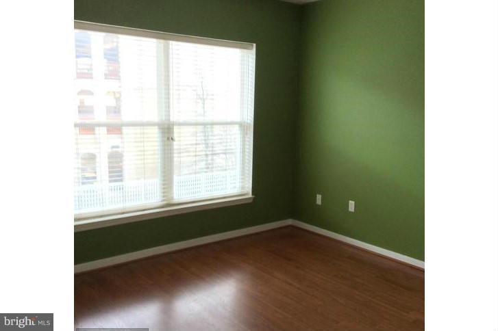 8045 Newell Street, Unit 220 Silver Spring, MD 20910 - Photo 9 of 21 Large Bedroom