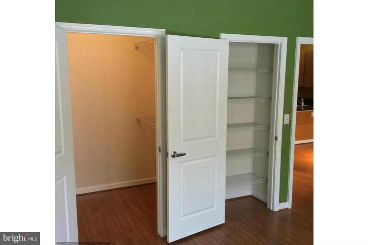 8045 Newell Street, Unit 220 Silver Spring, MD 20910 - Photo 10 of 21 Bedroom w/Walk-In & Bonus Closet