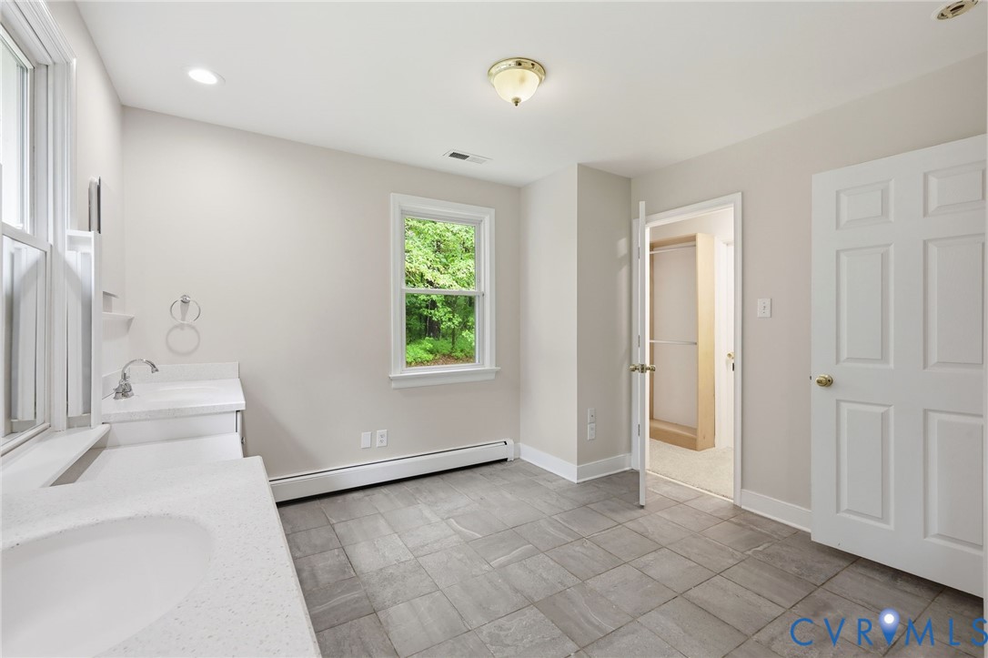 10152 Georgetown Road Mechanicsville, VA 23116 - Photo 22 of 35 a view of an empty room with a window