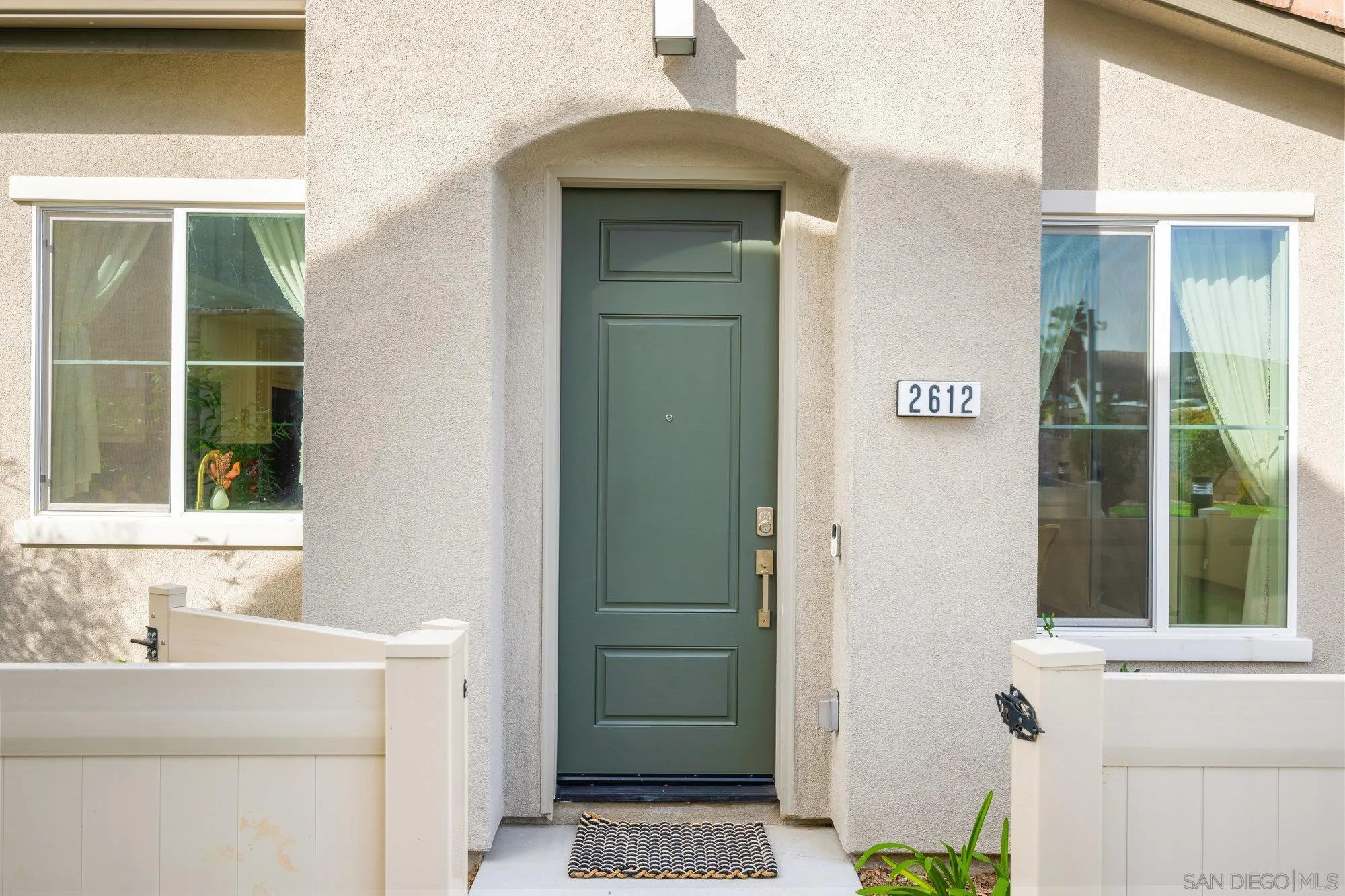 2612 Babaco Street Spring Valley, CA 91977 - Photo 11 of 37 a bathroom with a sink a vanity and a mirror