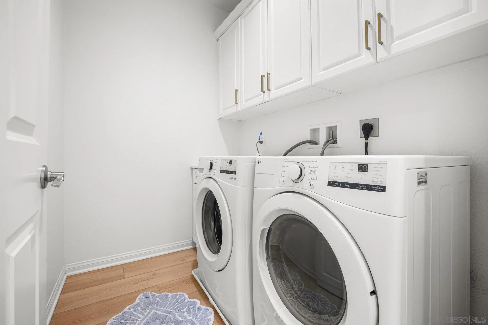 2612 Babaco Street Spring Valley, CA 91977 - Photo 21 of 37 a utility room with dryer and washer