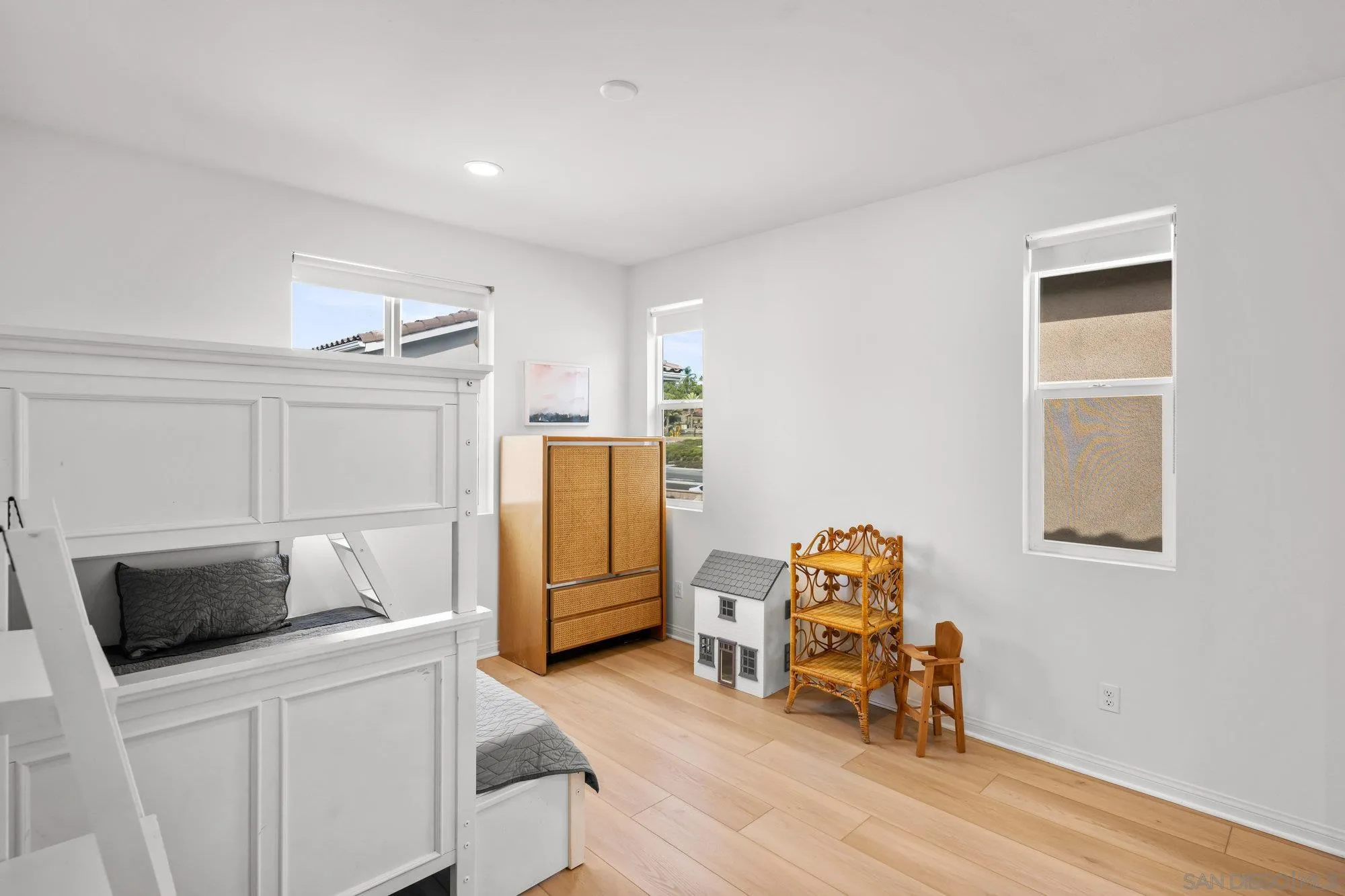 2612 Babaco Street Spring Valley, CA 91977 - Photo 26 of 37 a kitchen with a refrigerator and a sink