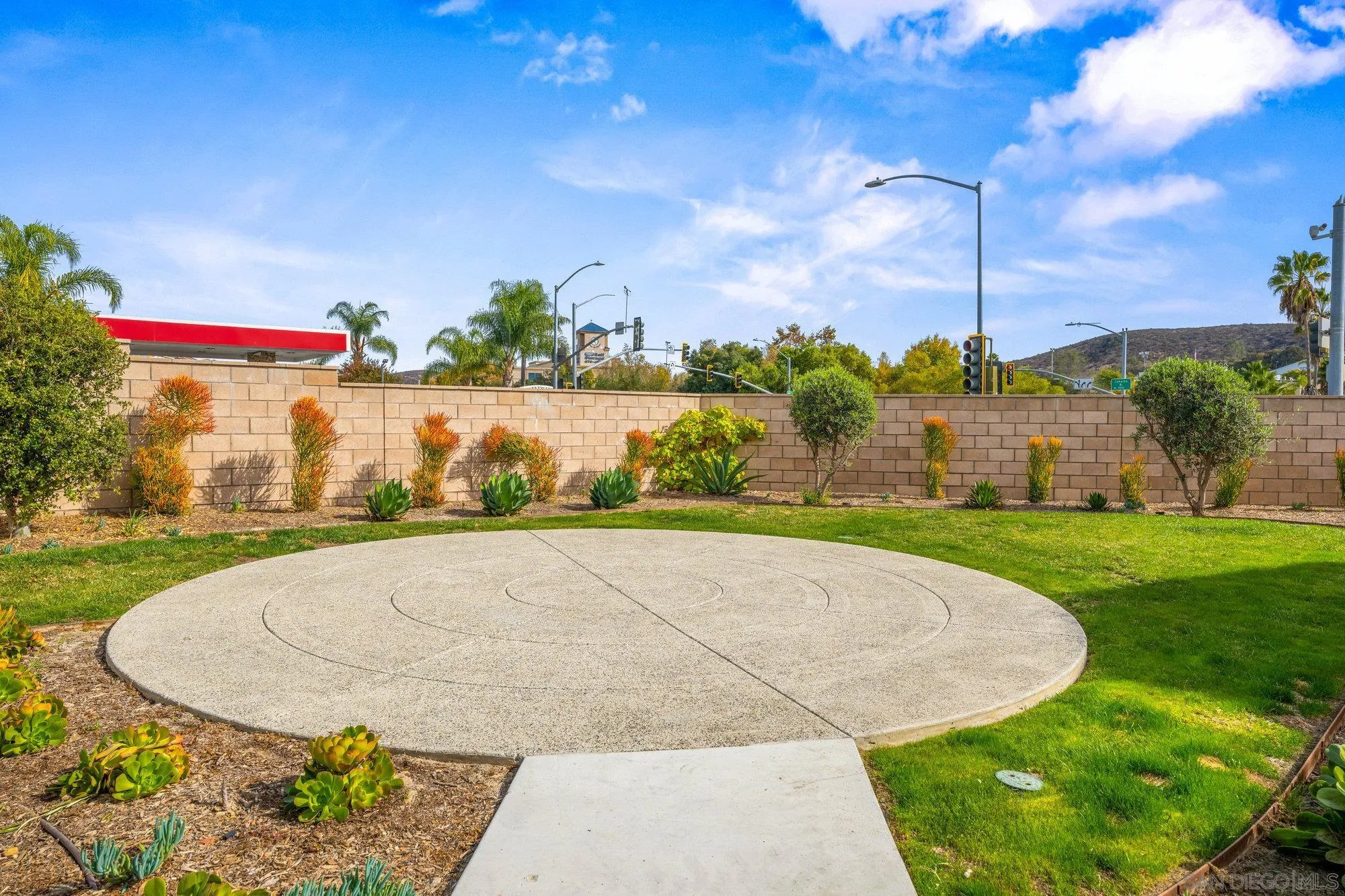 2612 Babaco Street Spring Valley, CA 91977 - Photo 28 of 37 a view of a swimming pool with a yard