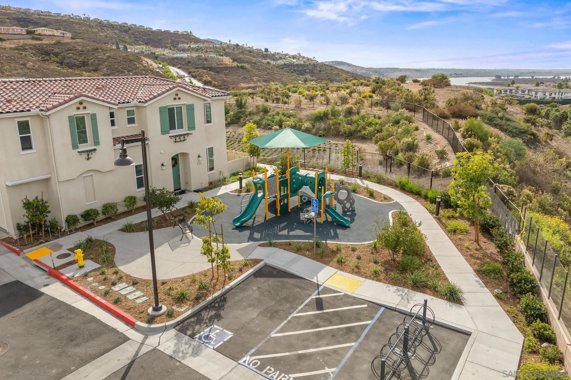 2612 Babaco Street Spring Valley, CA 91977 - Photo 35 of 37 an aerial view of a house with a swimming pool