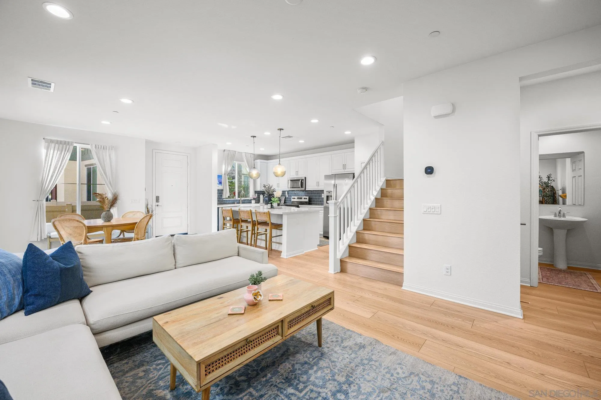 2612 Babaco Street Spring Valley, CA 91977 - Photo 5 of 37 a living room with furniture and wooden floor