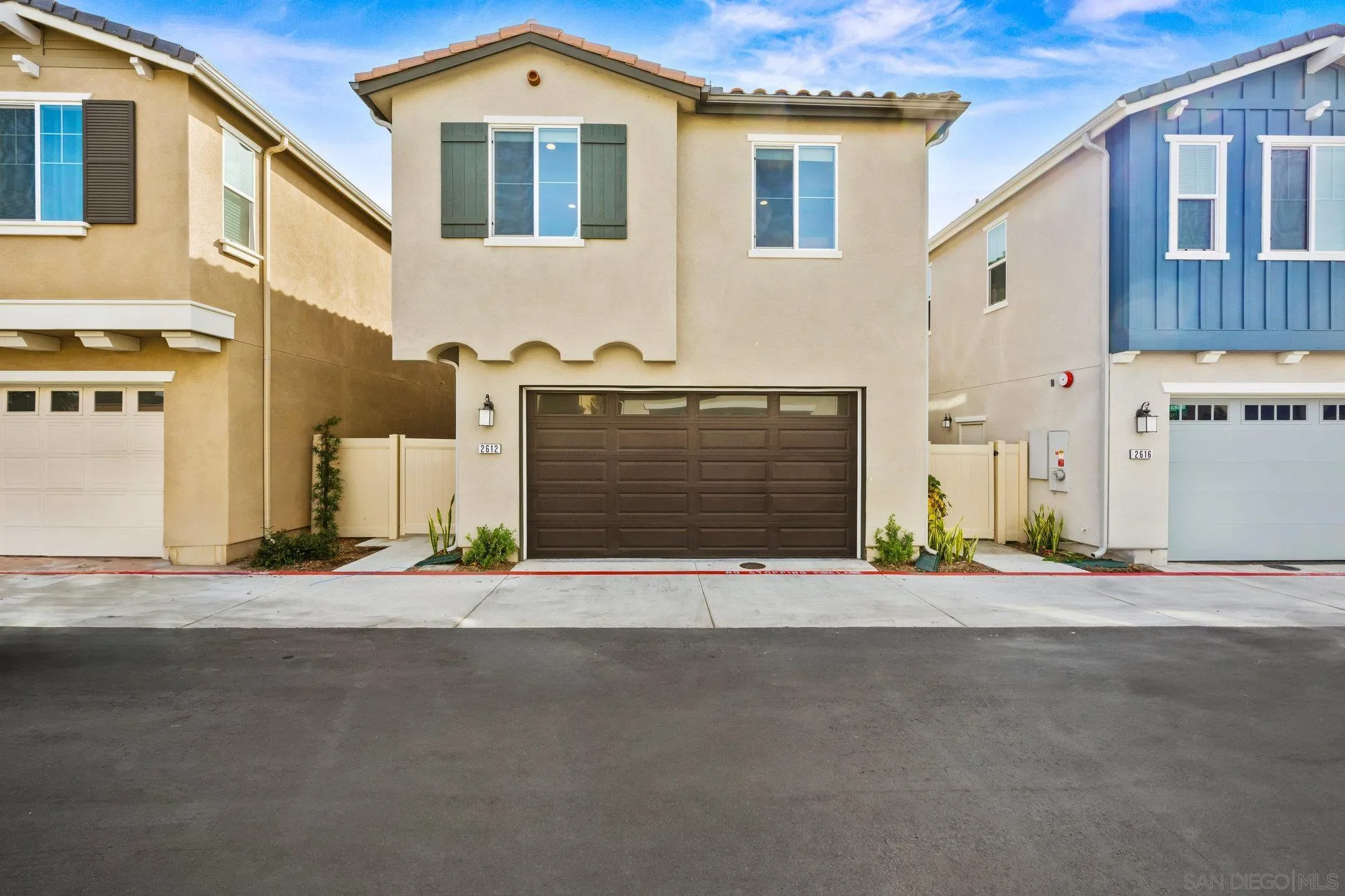 2612 Babaco Street Spring Valley, CA 91977 - Photo 7 of 37 a front view of a house with a road
