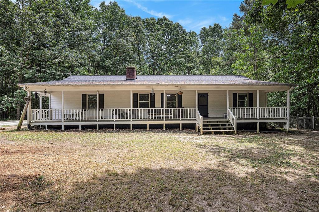 363 Smith Ferguson Road Dallas, GA 30157 - Photo 1 of 1 a view of a house with a window and balcony