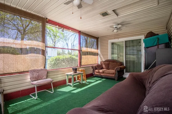 a outdoor living space with furniture and a garden