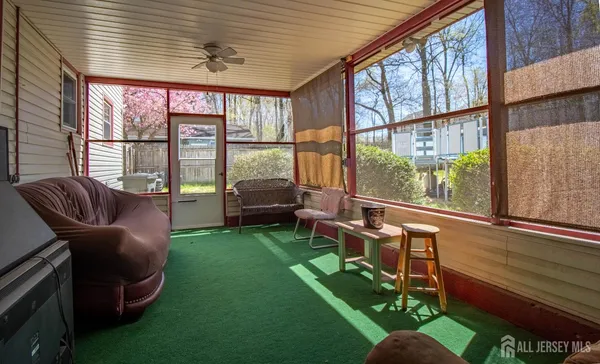 a living room filled with furniture