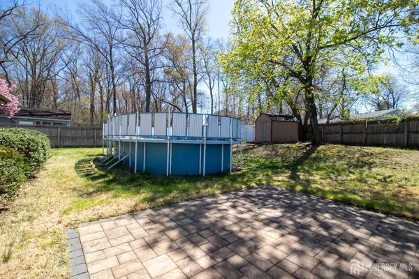 a view of a backyard with a garden
