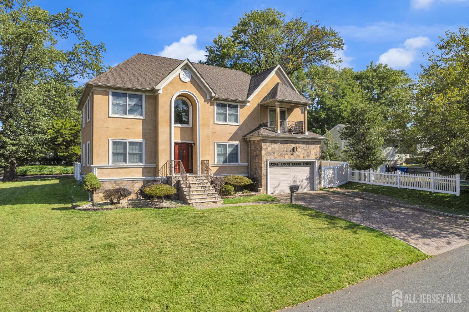 114 Holly Road Iselin, NJ 08830 - Photo 1 of 47 a front view of a house with a yard