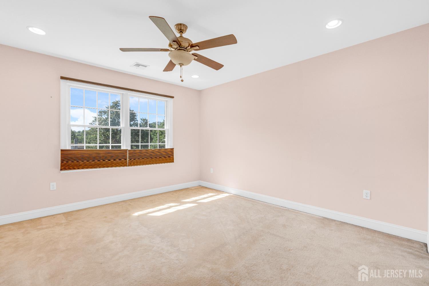 114 Holly Road Iselin, NJ 08830 - Photo 31 of 47 an empty room with a window