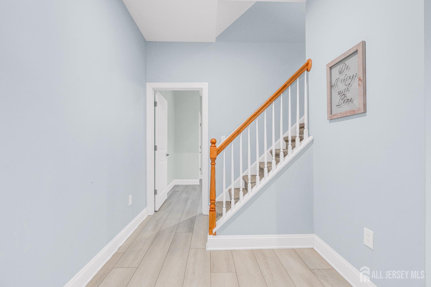 114 Holly Road Iselin, NJ 08830 - Photo 35 of 47 a view of entryway with wooden floor