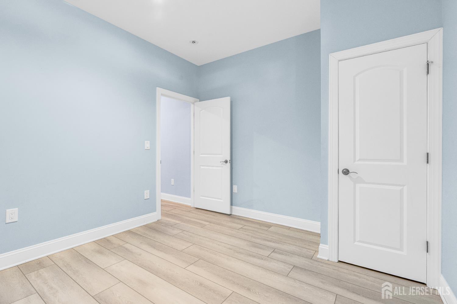 114 Holly Road Iselin, NJ 08830 - Photo 36 of 47 a view of an empty room