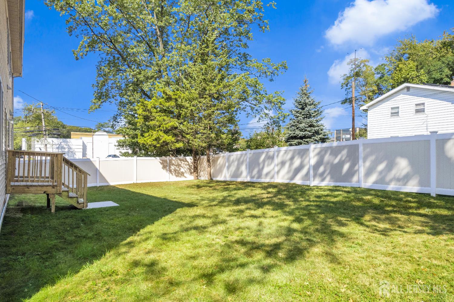 114 Holly Road Iselin, NJ 08830 - Photo 45 of 47 a view of yard with swimming pool