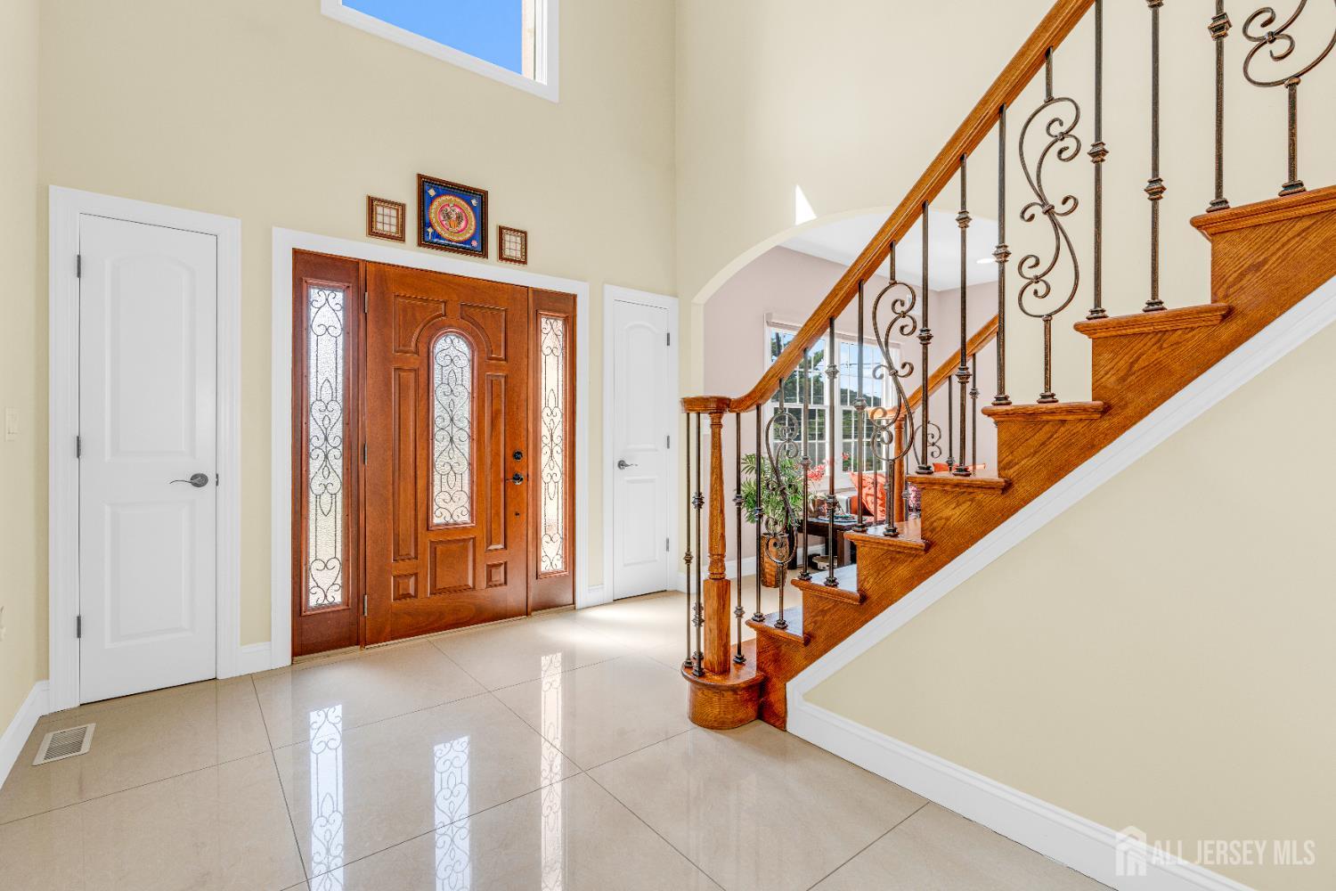 114 Holly Road Iselin, NJ 08830 - Photo 6 of 47 a view of an entryway with staircase