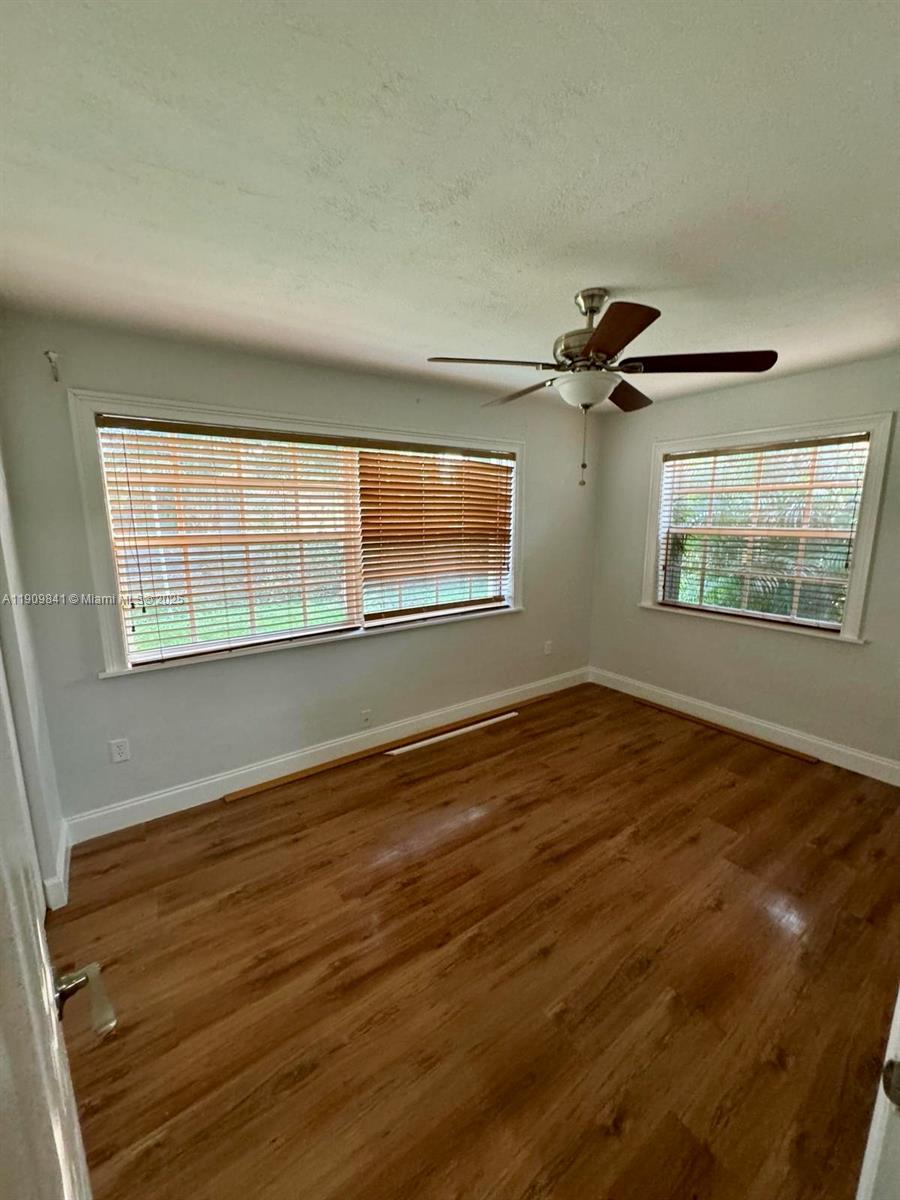 8670 Northwest 28th Place Sunrise, FL 33322 - Photo 9 of 13 a view of an empty room with a window