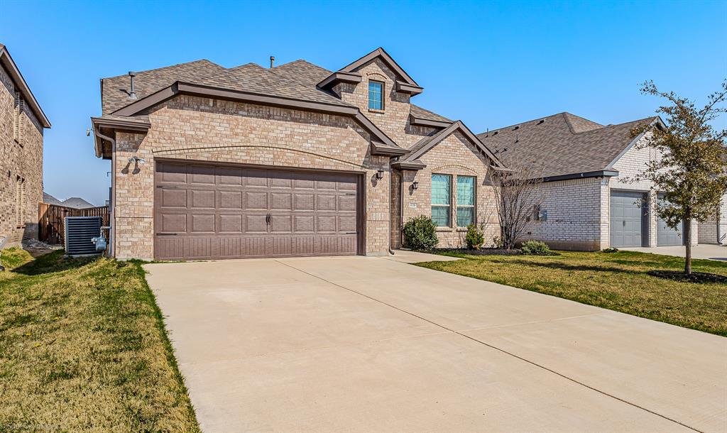 638 Pinehurst Road Red Oak, TX 75154 - Photo 1 of 38 French country home featuring a front lawn, brick siding, an attached garage, driveway, and a shingled roof