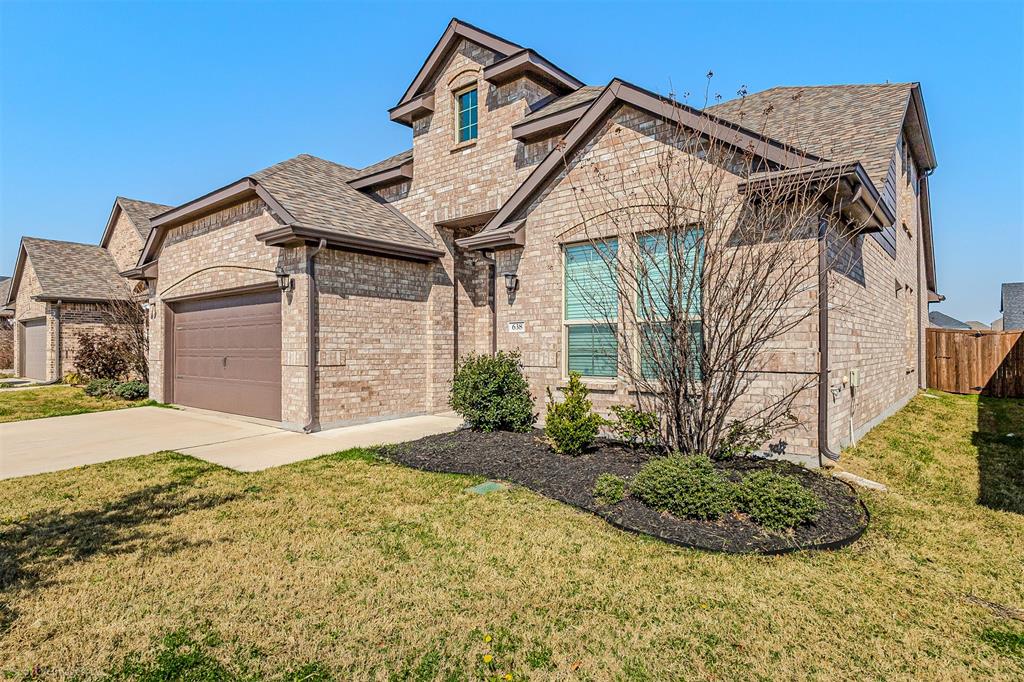 638 Pinehurst Road Red Oak, TX 75154 - Photo 2 of 38 French country home with brick siding, a garage, concrete driveway, and a shingled roof
