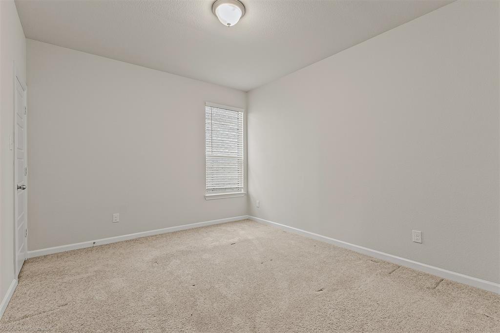 638 Pinehurst Road Red Oak, TX 75154 - Photo 26 of 38 Empty room with carpet