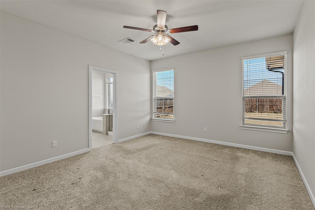 638 Pinehurst Road Red Oak, TX 75154 - Photo 30 of 38 Unfurnished room featuring ceiling fan and light carpet