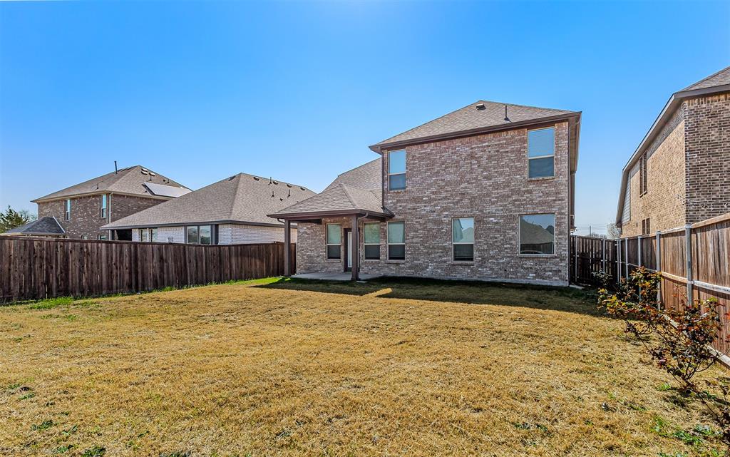 638 Pinehurst Road Red Oak, TX 75154 - Photo 37 of 38 Back of house with brick siding, a patio, and a fenced backyard