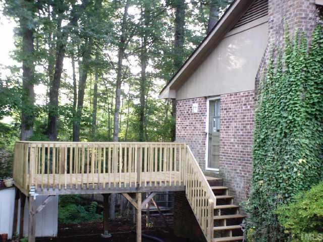 5901 Shamrock Road Durham, NC 27713 - Photo 2 of 6 Decking just re-done off kitchen for easy cook-outs and overlooks backyard