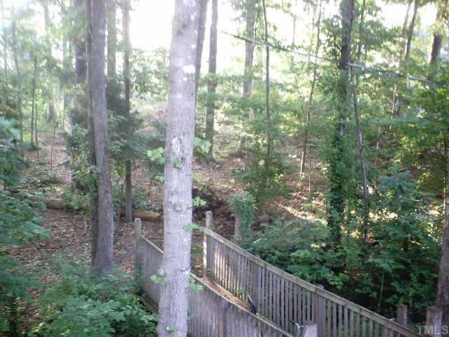 5901 Shamrock Road Durham, NC 27713 - Photo 4 of 6 View of wooded backyard from deck