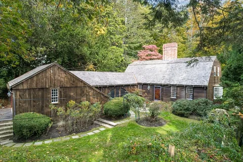 a house view with a garden space