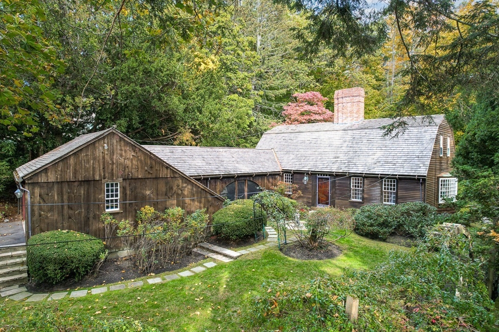 a house view with a garden space