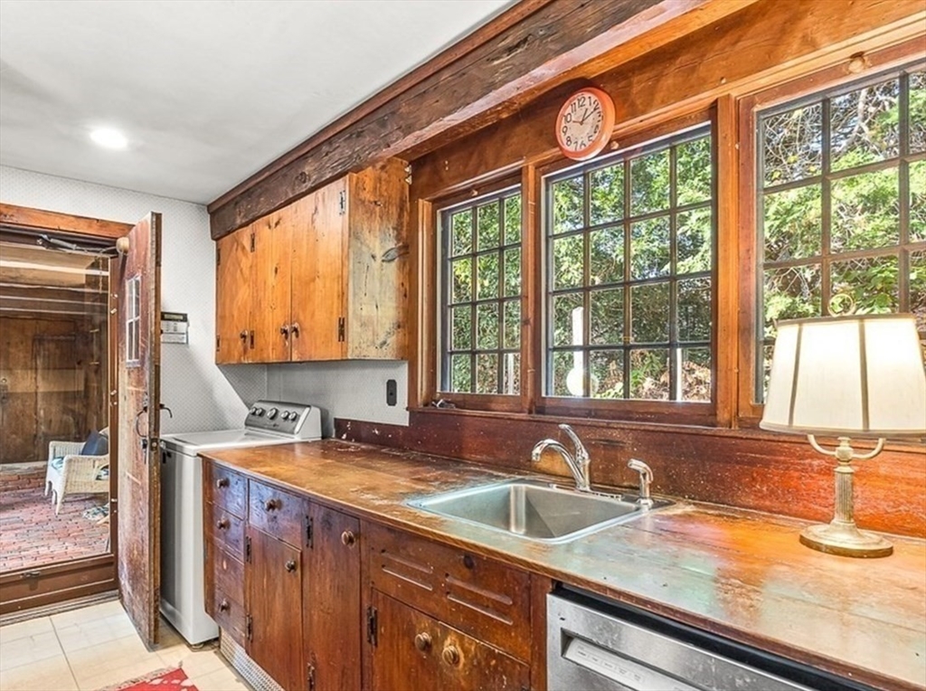 5 Wood Lane Winchester, MA 01890 - Photo 17 of 42 a view of a sink and a large window