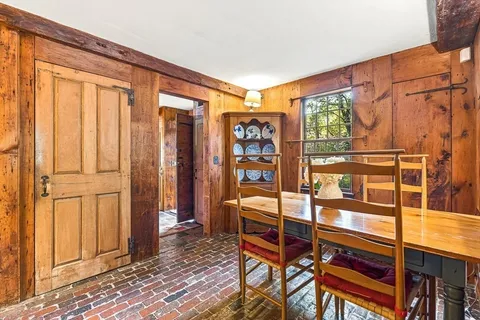 a view of a livingroom with furniture and front door