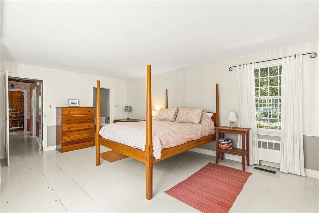 5 Wood Lane Winchester, MA 01890 - Photo 28 of 42 a bedroom with a bed and a cabinets