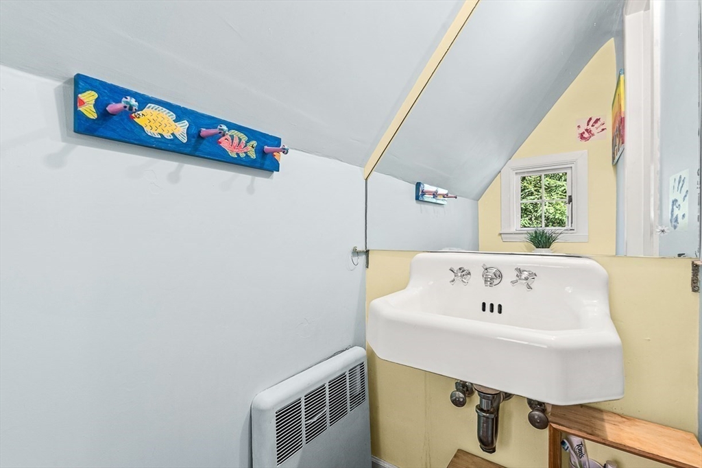 5 Wood Lane Winchester, MA 01890 - Photo 34 of 42 a bathroom with a sink and a bathtub