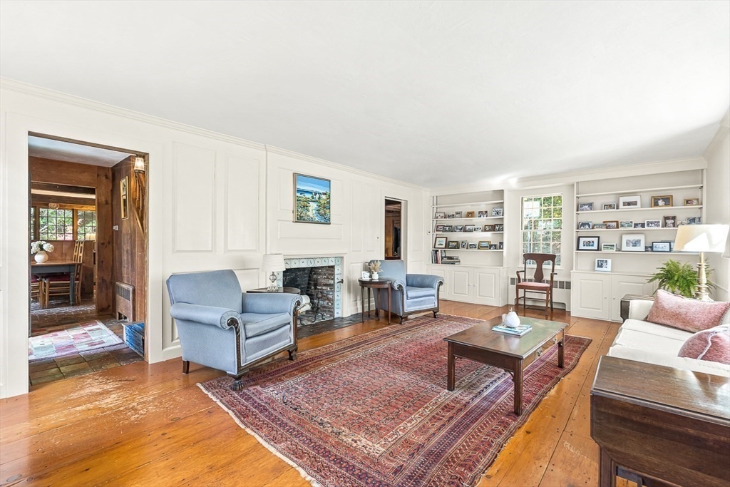 5 Wood Lane Winchester, MA 01890 - Photo 9 of 42 a living room with furniture a rug a lamp and a window