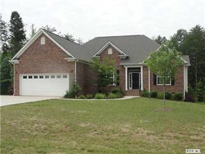 112 Rushing Water Lane Troutman, NC 28166 - Photo 1 of 16 a view of a house with a yard and garage
