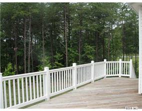 112 Rushing Water Lane Troutman, NC 28166 - Photo 14 of 16 a view of a wooden fence
