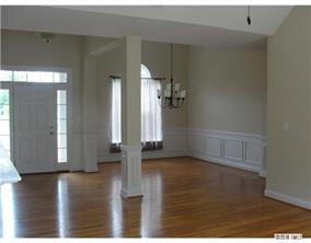112 Rushing Water Lane Troutman, NC 28166 - Photo 2 of 16 a view of empty room with wooden floor