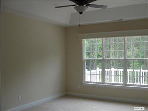 112 Rushing Water Lane Troutman, NC 28166 - Photo 7 of 16 an empty room with a window