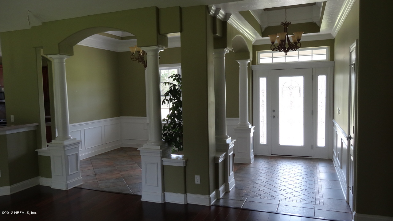 752 Varney Road Green Cove Springs, FL 32043 - Photo 6 of 22 Foyer and Dining Room