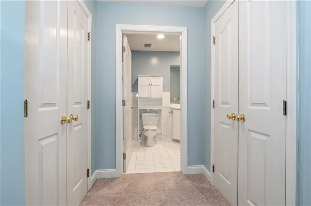 212 Adams Pointe Boulevard, Unit 7 Mars, PA 16046 - Photo 20 of 42 Dual Closets In The Primary Bedroom As You Enter The Bathroom
