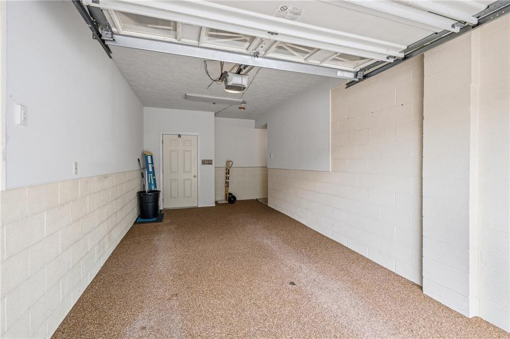 212 Adams Pointe Boulevard, Unit 7 Mars, PA 16046 - Photo 27 of 42 Neat And Clean Garage