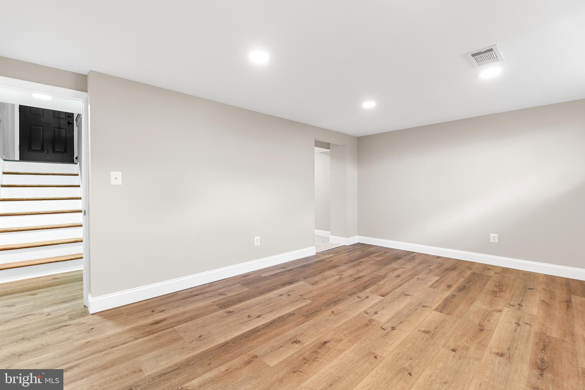 1618 Riverwood Road Baltimore, MD 21221 - Photo 19 of 26 a view of empty room with wooden floor