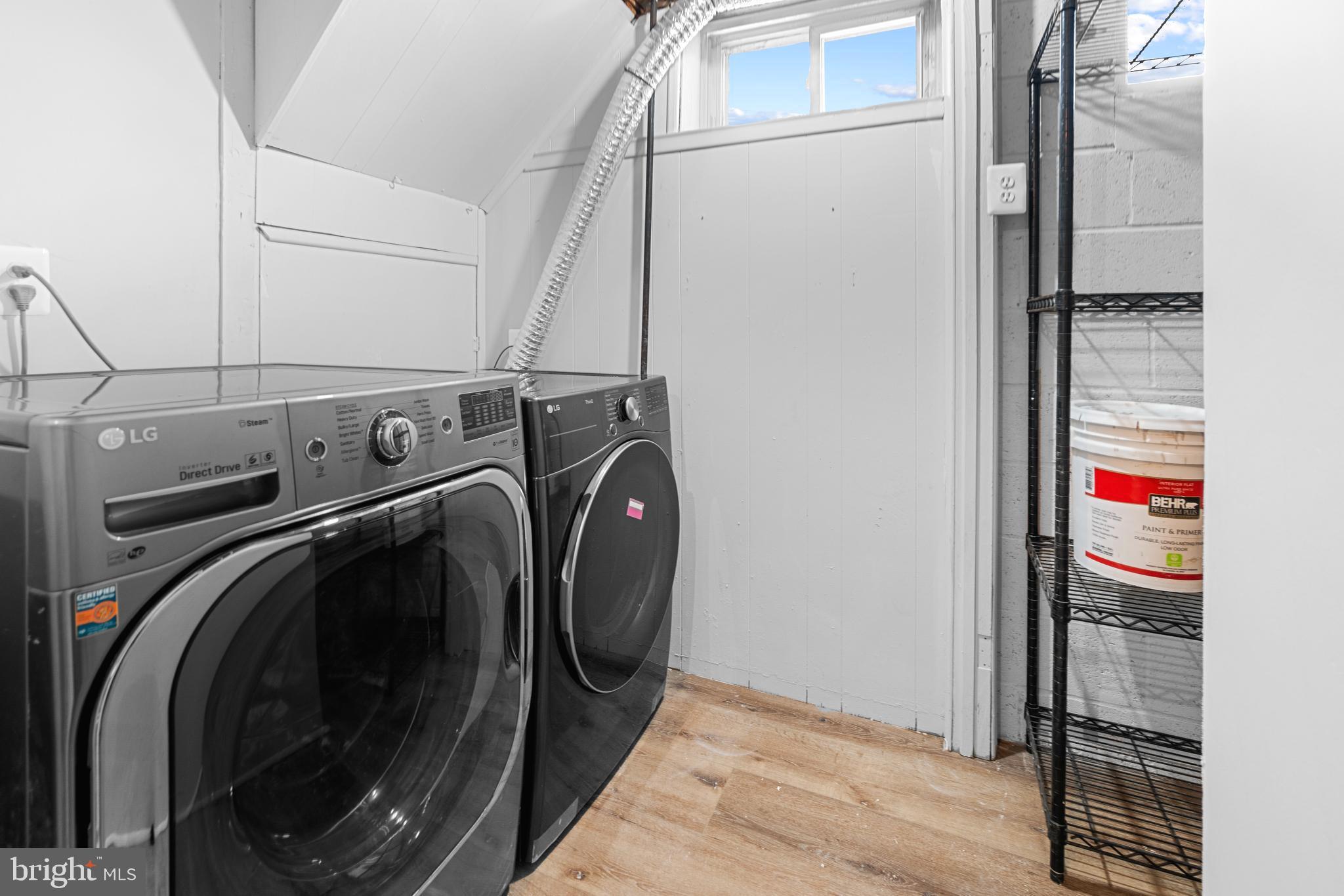 1618 Riverwood Road Baltimore, MD 21221 - Photo 23 of 26 a utility room with dryer and washer