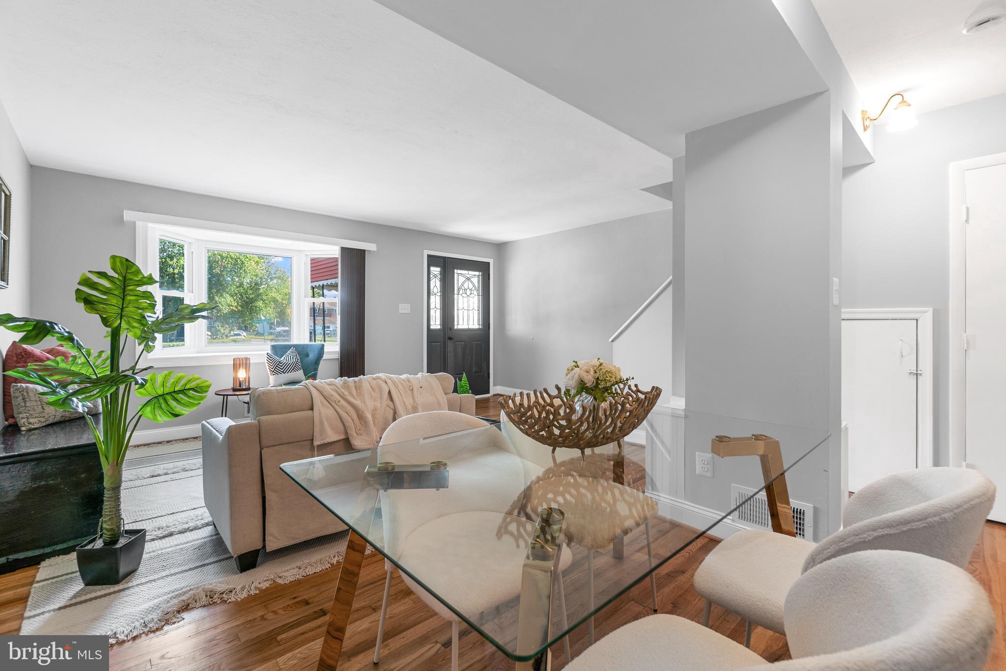 1618 Riverwood Road Baltimore, MD 21221 - Photo 4 of 26 a living room with furniture and a large window